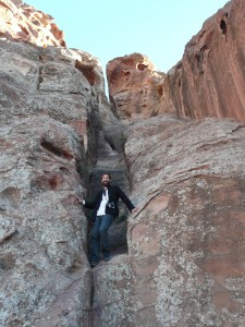 Hunter Hogan on a cliff in Petra